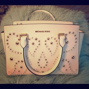 White Michael Kors handbag. Never been used.